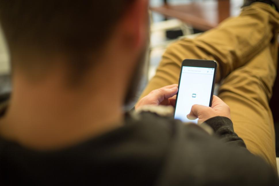 A person holding a cellphone